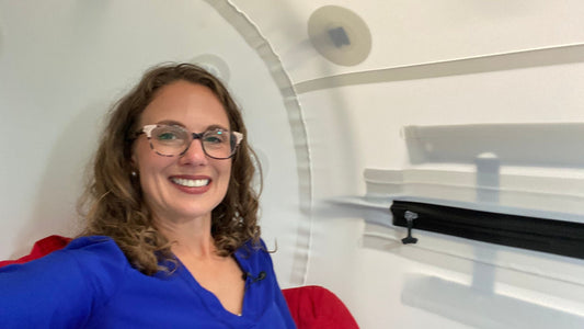 Audrey inside a home hyperbaric chamber with Lyme disease