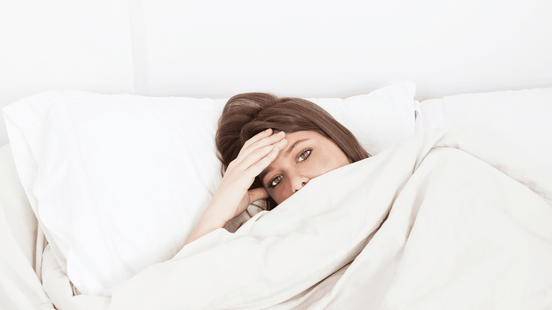 Woman with Lyme disease resting in bed before hyperbaric chamber