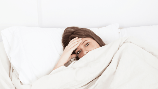 Woman with Lyme disease resting in bed before hyperbaric chamber