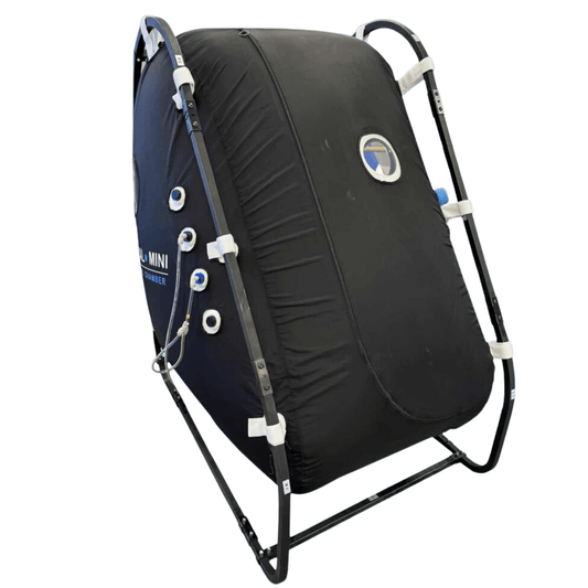 Oxygen Health Systems Vertical Mini Ultra Wide hyperbaric chamber sitting front entry