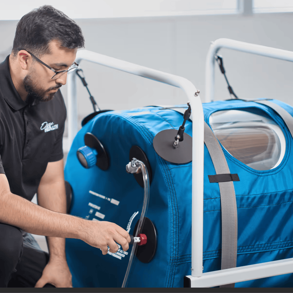 OxyHealth QUAMVIS 320 soft-sided hyperbaric chamber fully assembled with its external steel frame